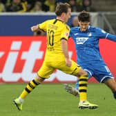 Dortmund's German midfielder Mario Goetze (L) and Hoffenheim's Austrian midfielder Florian Grillitsch vie for the ball during the German First division Bundesliga football match TSG 1899 Hoffenheim v BVB Borussia Dortmund in Sinsheim, southern Germany, on December 20, 2019. (Photo by Daniel ROLAND / AFP) / DFL REGULATIONS PROHIBIT ANY USE OF PHOTOGRAPHS AS IMAGE SEQUENCES AND/OR QUASI-VIDEO (Photo by DANIEL ROLAND/AFP via Getty Images)