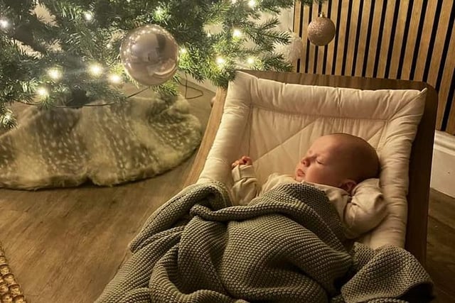Crew, age 3 months, knows you have to get a good night's sleep to make sure Santa visits on Christmas Eve ...
