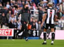 Club doctor Paul Catterson runs to assist an elderly man who had suffered a cardiac arrest at St James's Park.