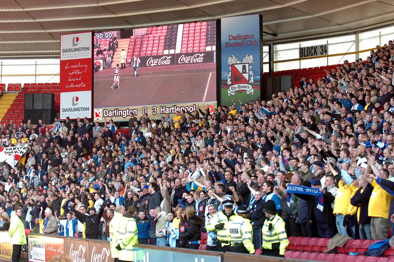 Hartlepool United fans celebrate the 3-0 derby away win at Darlington's TFM 96.6 Arena in March 2007.