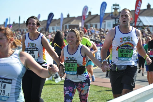 Crossing the finishing line together in 2019.
