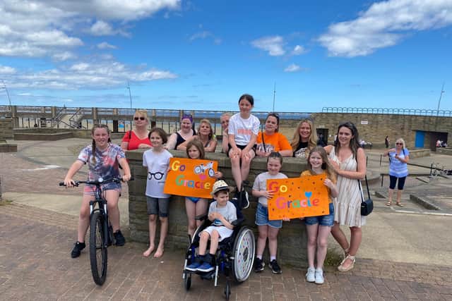 Gracie Young was met by friends and family at South Shields Amphitheatre when she completed her cycle challenge.