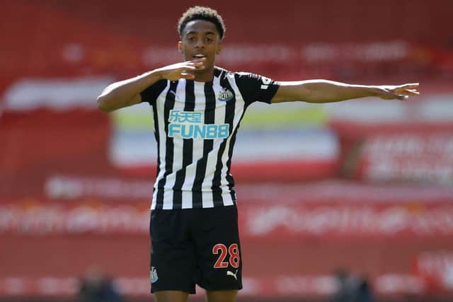 Newcastle United's English midfielder Joe Willock celebrates after scoring the equalising goal during the English Premier League football match between Liverpool and Newcastle United at Anfield in Liverpool, north west England on April 24, 2021.