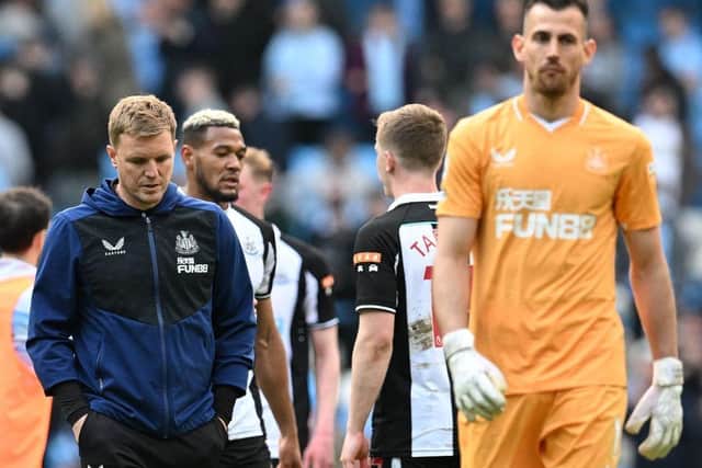 Newcastle United's English head coach Eddie Howe (L) and Newcastle United's Slovakian goalkeeper Martin Dubravka (R) leave the pitch after the English Premier League football match between Manchester City and Newcastle United at the Etihad Stadium in Manchester, north west England, on May 8, 2022. (Photo by PAUL ELLIS/AFP via Getty Images)