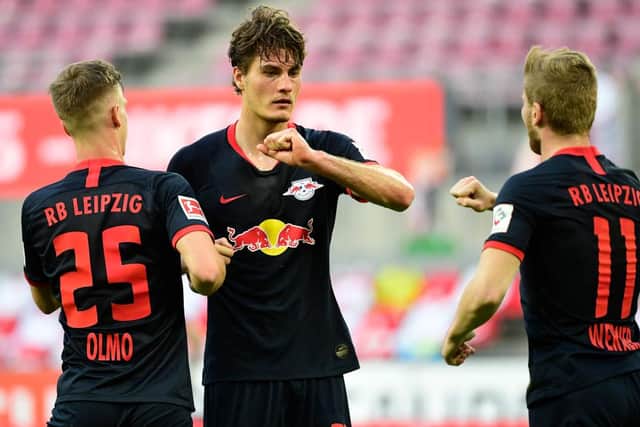 COLOGNE, GERMANY - JUNE 01: Patrik Schick of Leipzig celebrates with team mates after scoring his sides first goal during the Bundesliga match between 1. FC Koeln and RB Leipzig at RheinEnergieStadion on June 1, 2020 in Cologne, Germany. (Photo by Ina Fassbender/Pool via Getty Images)