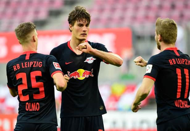 COLOGNE, GERMANY - JUNE 01: Patrik Schick of Leipzig celebrates with team mates after scoring his sides first goal during the Bundesliga match between 1. FC Koeln and RB Leipzig at RheinEnergieStadion on June 1, 2020 in Cologne, Germany. (Photo by Ina Fassbender/Pool via Getty Images)