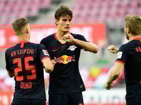 COLOGNE, GERMANY - JUNE 01: Patrik Schick of Leipzig celebrates with team mates after scoring his sides first goal during the Bundesliga match between 1. FC Koeln and RB Leipzig at RheinEnergieStadion on June 1, 2020 in Cologne, Germany. (Photo by Ina Fassbender/Pool via Getty Images)