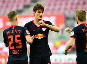 COLOGNE, GERMANY - JUNE 01: Patrik Schick of Leipzig celebrates with team mates after scoring his sides first goal during the Bundesliga match between 1. FC Koeln and RB Leipzig at RheinEnergieStadion on June 1, 2020 in Cologne, Germany. (Photo by Ina Fassbender/Pool via Getty Images)