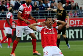 Reims' forward Hugo Ekitike celebrates after scoring a goal during the French L1 football match between Stade de Reims and OGC Nice at Stade Auguste-Delaune in Reims, northern France on May 21, 2022. (Photo by FRANCOIS NASCIMBENI / AFP) (Photo by FRANCOIS NASCIMBENI/AFP via Getty Images)