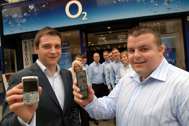 Staff outside the 02 store in King Street on the first anniversary of the store in 2008.