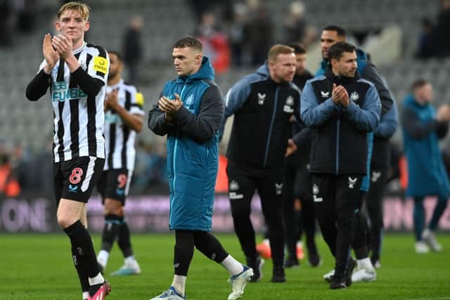 Anthony Gordon and Kieran Trippier applauds Newcastle United fans.