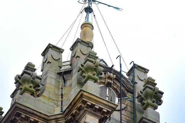 Above the clock and belfry is a weather vane shaped like an Elizabethan Galleon. It's 7ft high and when it's taken down for cleaning can fit two men standing.