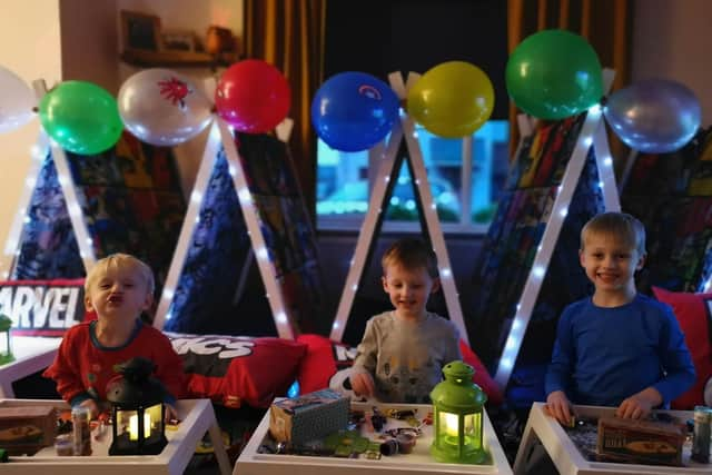 Brothers Ivor, Eli and Archie having a tipi party at home.