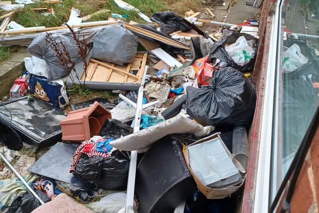 Claire Carty ignored warnings to clean up the garden of her property - she was ordered to pay £838.09.