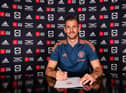 New Manchester United signing Martin Dubravka  signs a contract at Carrington Training Ground on September 01, 2022 in Manchester, England. (Photo by Manchester United/Manchester United via Getty Images)