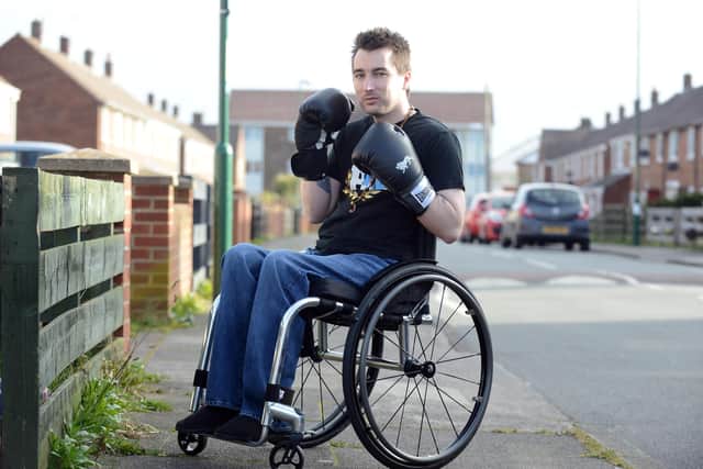 Andrew Barkess is taking part in a charity boxing event in his wheelchair.