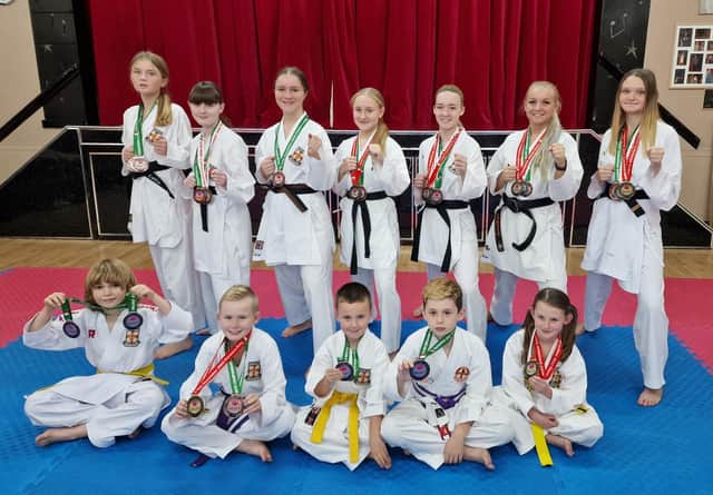 The Dokan squad with their medals from Italy.