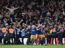 Bruno Guimaraes of Newcastle United celebrates after Alexander Isak of Newcastle United scores the team's second goal during the Premier League match between Nottingham Forest and Newcastle United at City Ground on March 17, 2023 in Nottingham, England. (Photo by Shaun Botterill/Getty Images)