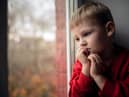 Loneliness can be an issue for children. Picture posed by model.