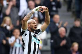 Joelinton of Newcastle United celebrates after scoring the team's second goal during the Premier League match between Newcastle United and Tottenham Hotspur at St. James Park on April 23, 2023 in Newcastle upon Tyne, England. (Photo by Clive Brunskill/Getty Images)