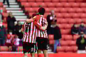 Lynden Gooch and Luke O’Nien at the end of the game.