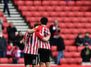 Lynden Gooch and Luke O’Nien at the end of the game.