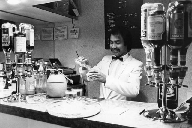 Owner Syed Ashraf Hussein in Zolsa's bar in January 1983.