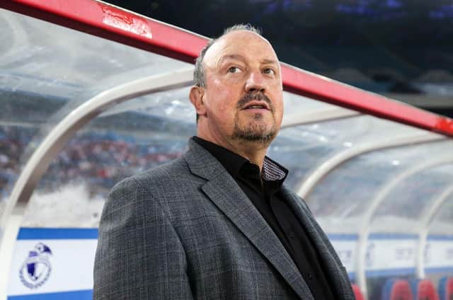 Dalian Yifang's new head coach Rafael Benitez looks on during the Chinese Super League (CSL) football match between Dalian Yifang and Henan Jianye in Dalian in northeast China's Liaoning province on July 7, 2019. (Photo by STR / AFP) / China OUT        (Photo credit should read STR/AFP via Getty Images)