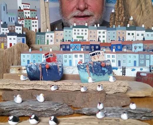 David Routledge with his artwork.