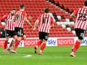 Charlie Wyke celebrates his equaliser