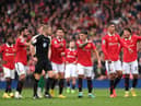 Manchester United players remonstrate with Referee, Craig Pawson following a disallowed goal by Cristiano Ronaldo (4th R) of Manchester United during the Premier League match between Manchester United and Newcastle United at Old Trafford on October 16, 2022 in Manchester, England. (Photo by Stu Forster/Getty Images)