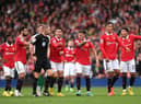 Manchester United players remonstrate with Referee, Craig Pawson following a disallowed goal by Cristiano Ronaldo (4th R) of Manchester United during the Premier League match between Manchester United and Newcastle United at Old Trafford on October 16, 2022 in Manchester, England. (Photo by Stu Forster/Getty Images)