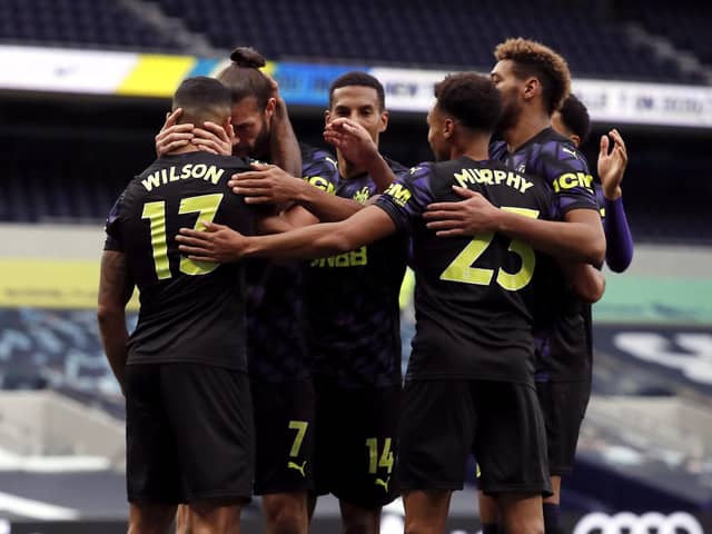 Callum Wilson, left, is congratulated after converting a penalty.
