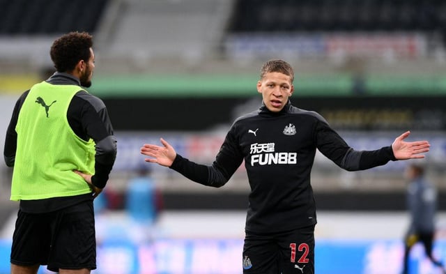 Newcastle United's English striker Dwight Gayle (R) gestures while talking with Newcastle United's Brazilian striker Joelinton (L) ahead of the kickoff during the English Premier League football match between Newcastle United and Aston Villa at St James' Park in Newcastle-upon-Tyne, north east England on March 12, 2021.