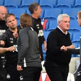 Steve Bruce, Manager of Newcastle United interacts with Graham Potter, Manager of Brighton and Hove Albion at full-time after the Premier League match between Brighton & Hove Albion and Newcastle United at American Express Community Stadium on July 20, 2020 in Brighton, England.