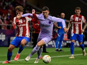 Antoine Griezmann fights for the ball with Barcelona defender Clement Lenglet  (Photo by JAVIER SORIANO/AFP via Getty Images)