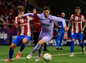 Antoine Griezmann fights for the ball with Barcelona defender Clement Lenglet  (Photo by JAVIER SORIANO/AFP via Getty Images)