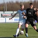 Charlie McArthur of Scotland vies with Dzenan Pejcinovic of Germany during the UEFA Under17 European Championship Qualifier match between Germany U17 and Scotland U17 on March 26, 2022 in Glasgow, Scotland. (Photo by Ian MacNicol/Getty Images)