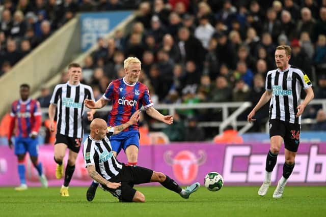 Jonjo Shelvey of Newcastle United tackles Will Hughes of Crystal Palace during the Carabao Cup Third Round match between Newcastle United and Crystal Palace at St James' Park on November 09, 2022 in Newcastle upon Tyne, England. (Photo by Stu Forster/Getty Images)