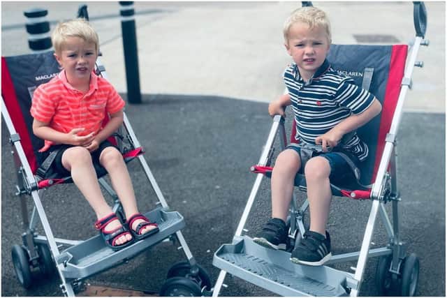 Identical twins Michael and Jaxon Parker. 
Photo by Lisa Parker.