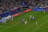 Jude Bellingham of England, scores his team's first goal past Martin Dubravka of Slovakia with an acrobatic kick (Picture: Shaun Botterill/Getty Images)