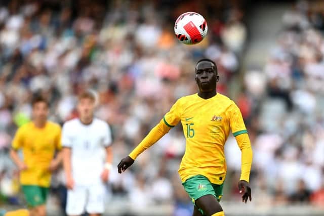 Garang Kuol of the Socceroos makes a break during the International Friendly match between the New Zealand All Whites and Australia Socceroos at Eden Park on September 25, 2022 in Auckland, New Zealand. (Photo by Hannah Peters/Getty Images)