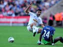 SWANSEA, WALES - OCTOBER 04:  Newcastle player Chieck Tiote (r) beats Neil Taylor to the ball during the Barclays Premier League match between Swansea City and Newcastle United at Liberty Stadium on October 4, 2014 in Swansea, Wales.  (Photo by Stu Forster/Getty Images)
