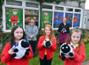 The "messy sheep" window display at Jarrow Cross C of E School. Pupils from left Grace Davis, ten, Ava-Rose McGibbon, nine and Chloe Sawkill, nine with Rev. Lesley Jones and headteacher Susan McBeth. The girls are in  the same bubble.