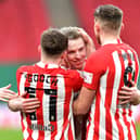 Grant Leadbitter celebrates Sunderland's win the Papa John's Trophy