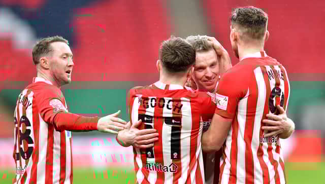 Grant Leadbitter celebrates Sunderland's win the Papa John's Trophy