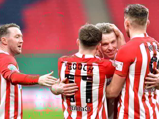 Grant Leadbitter celebrates Sunderland's win the Papa John's Trophy