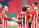 Grant Leadbitter celebrates Sunderland's win the Papa John's Trophy