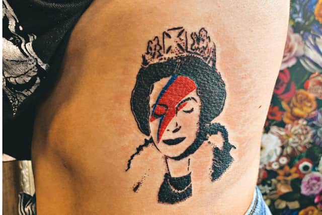 Ink Angel created this stunning Queen Elizabeth II tattoo.