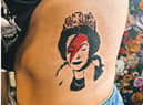 Ink Angel created this stunning Queen Elizabeth II tattoo.